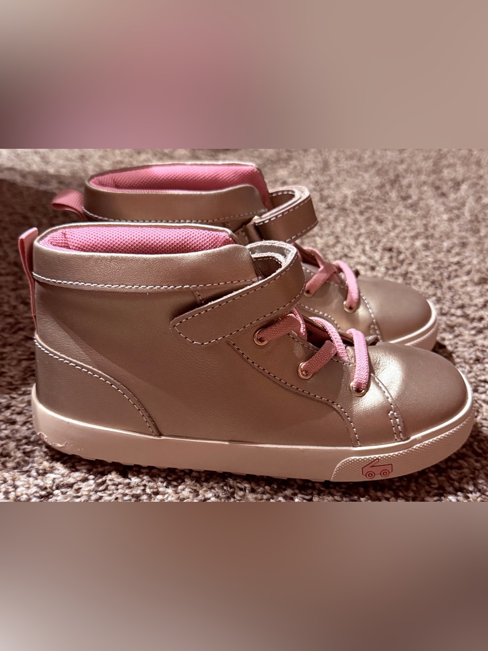 See Kai Run Hudson high-top sneakers in a metallic gold leather finish